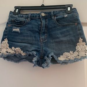 Girls Jean shorts with lace.
